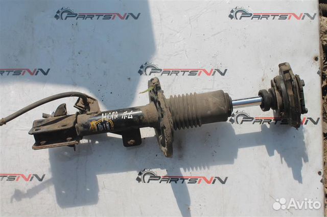 Амортизатор передний левый Ниссан Микра