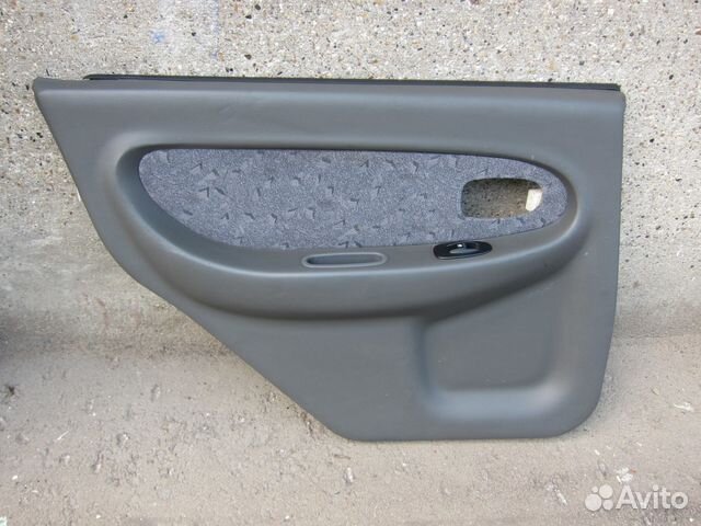 Обшивка задней левой двери Kia Spectra