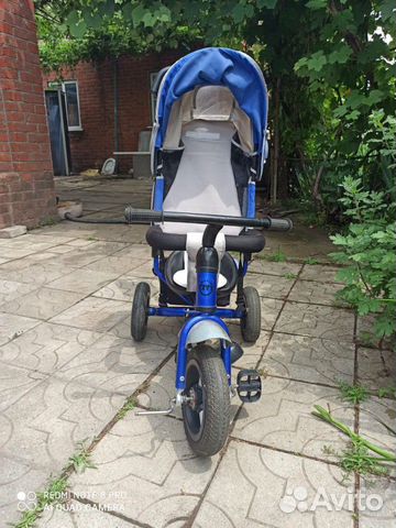 Детский трехколесный велосипед с крышей Детский трехколесный велосипед с крышей