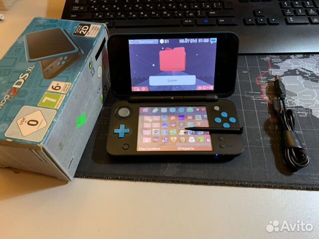 New Nintendo 2ds xl 32gb + r4 gold 16gb New Nintendo 2ds xl 32gb + r4 gold 16gb