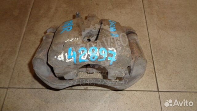 Суппорт передний правый Opel Corsa D