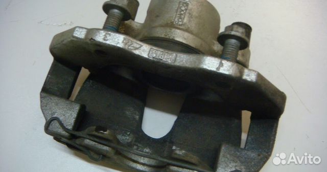 Суппорт тормозной передний на ford Focus II