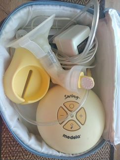Молокоотсос medela swing